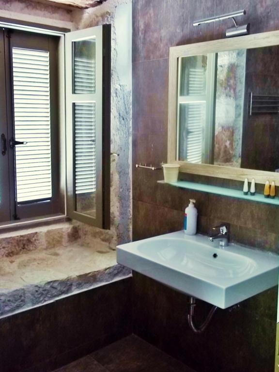 Alicelia Boutique Inn Вати Стая снимка