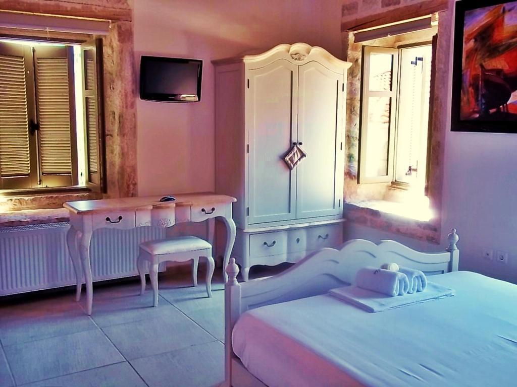 Alicelia Boutique Inn Вати Стая снимка