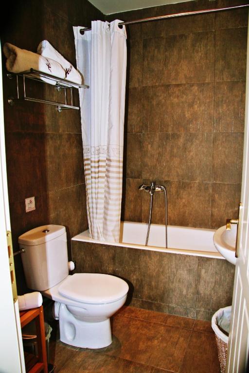 Alicelia Boutique Inn Вати Стая снимка